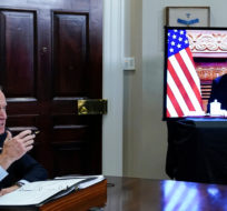 President Joe Biden meets virtually with Chinese President Xi Jinping from the Roosevelt Room of the White House in Washington, Monday, Nov. 15, 2021. Susan Walsh/AP Photo.