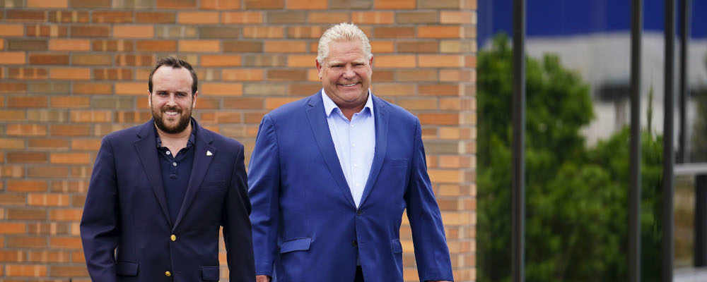 Conservative leader Doug Ford and Conservative candidate Jeremy Roberts, Ottawa West-Nepean, arrive during a campaign stop in Ottawa on May 30, 2022. Sean Kilpatrick/The Canadian Press.