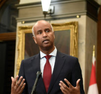 Minister of Housing and Diversity and Inclusion Ahmed Hussen speaks during a news conference on the government’s work to combat Islamophobia, on the one-year anniversary of the vehicle attack on the Afzaal family in London, Ont., in the foyer of the House of Commons in Ottawa, on Monday, June 6, 2022. Justin Tang/The Canadian Press. 