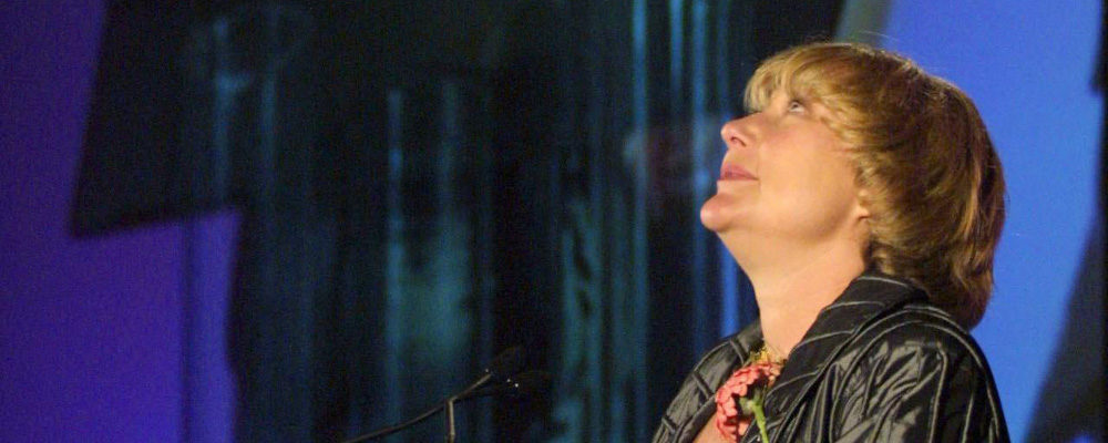 Globe and Mail columnist Margaret Wente reflects on Sept. 11 as she accept her National Newspaper Award for columns in Calgary on Friday, April, 26, 2002. The appointment of former Globe and Mail columnist Wente to a senior fellow position with Toronto's Massey College came under review amid fierce opposition from students and staff. Controversy emerged after the school, affiliated with the University of Toronto, announced that Wente was one of 46 people in various fields named a senior fellow and member of the Quadrangle Society. Jeff McIntosh/The Canadian Press.
