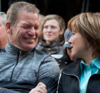 Lululemon founder Chip Wilson shares a laugh with British Columbia Premier Christy Clark in Richmond, B.C., on December 7, 2012. Darryl Dyck/The Canadian Press.