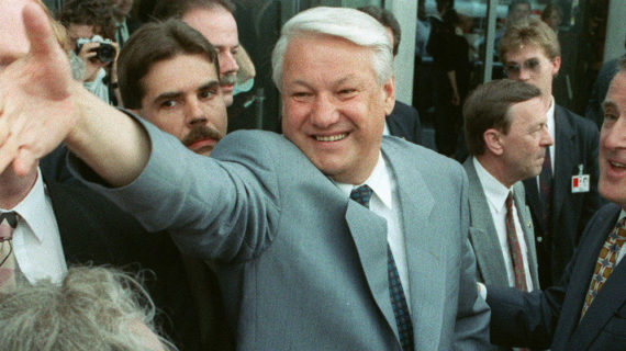 Russian President Boris Yeltsin reaches out to well-wishers along with Canadian Prime Minister Brian Mulroney in this June 19, 1992 file photo in Ottawa. Fred Chartrand/The Canadian Press.