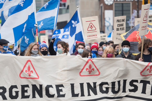 People take part in a demonstration in Montreal, Saturday, November 28, 2020, where they protested against government funding for infrastructure projects at two English-language educational institutions and also calling on the city of Montreal to set up a body to protect the French language. Graham Hughes/The Canadian Press. 
