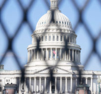The Capitol is seen through security fencing, Thursday, March 4, 2021, on Capitol Hill in Washington. Jacquelyn Martin/AP Photo.