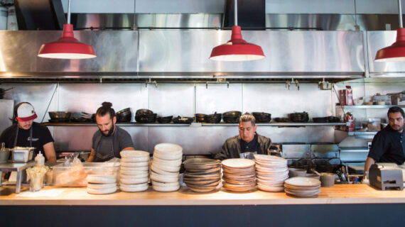 Kitchen staff prepare for dinner service at Edible Canada restaurant in Vancouver, B.C., on Wednesday October 11, 2017. The restaurant industry may be booming in British Columbia, but a combination of the high cost of living, tight profit margins and a shrinking workforce has made it difficult for kitchens to find enough staff. Darryl Dyck/The Canadian Press.