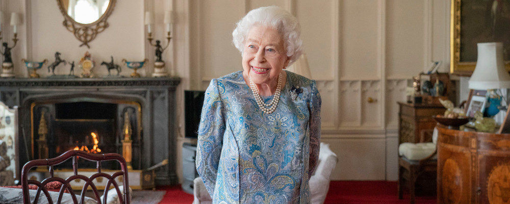 Britain's Queen Elizabeth II smiles while receiving the President of Switzerland Ignazio Cassis and his wife Paola Cassis during an audience at Windsor Castle in Windsor, England, Thursday, April 28, 2022. Dominic Lipinski/Pool Photo via AP.