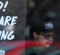 A hiring sign is displayed at a restaurant in Schaumburg, Ill., April 1, 2022. Nam Y. Huh/AP Photo.
