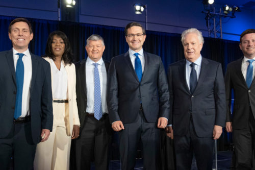 Candidates Patrick Brown, left, Leslyn Lewis, Scott Aitchison, Pierre Poilievre, Jean Charest and Roman Baber, pose for photos after the French-language Conservative Leadership debate Wednesday, May 25, 2022  in Laval, Que. Ryan Remiorz/The Canadian Press. 