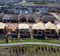 New homes are built in a housing construction development in the west-end of Ottawa on Thursday, May 6, 2021. Sean Kilpatrick/The Canadian Press.