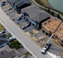 New homes are built in a housing construction development in the west-end of Ottawa on Thursday, May 6, 2021. Sean Kilpatrick/The Canadian Press.