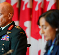 Chief of the Defence Staff, General Wayne Eyre, left, and Minister of National Defence, Anita Anand, at a press conference in Ottawa on Monday, May 30, 2022. Sean Kilpatrick/The Canadian Press.