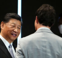 Prime Minister Justin Trudeau talks with Chinese President Xi Jinping after taking part in the closing session at the G20 Leaders Summit in Bali, Indonesia on Wednesday, Nov. 16, 2022. Sean Kilpatrick/The Canadian Press.