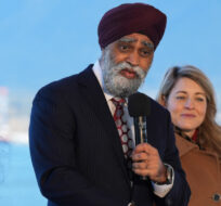 Minister of International Development and Minister responsible for the Pacific Economic Development Agency of Canada Harjit Sajjan, second left, speaks as Minister of International Trade, Export Promotion, Small Business and Economic Development Mary Ng, from left to right, Minister of Foreign Affairs Melanie Joly and Minister of Public Safety Marco Mendocino listen during a news conference to announce Canada's Indo-Pacific strategy, in Vancouver, on Sunday, November 27, 2022. Darryl Dyck/The Canadian Press.
