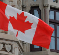 The Canadian flag flies outside the prime minister's office in Ottawa, Wednesday, April 8, 2020. Adrian Wyld/The Canadian Press.