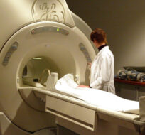 A technician operates an MRI machine at a private clinic in Calgary. Jeff McIntosh/The Canadian Press.