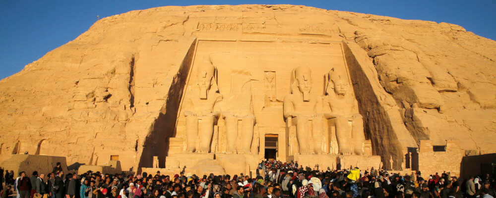 Thousands of visitors line up to visit the Great Temple of Ramses II, to observe the sun to send a beam of light into the ancient temple's dark inner chamber for over ten minutes in Abu Simbel, 870 kilometers (540 miles) south of Cairo, Egypt, Friday, Feb. 22, 2019. Amr Nabil/AP Photo.