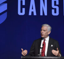 Dominic Barton speaks at the Canadian Association of Defence and Security Industries CANSEC trade show in Ottawa on May 30, 2018. Justin Tang/The Canadian Press.