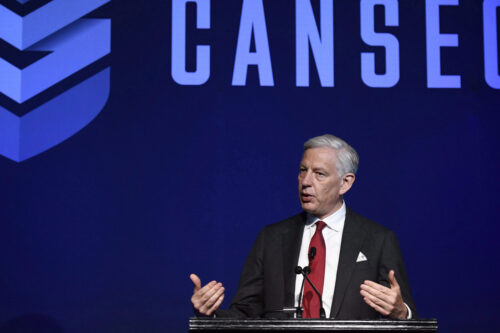 Dominic Barton speaks at the Canadian Association of Defence and Security Industries CANSEC trade show in Ottawa on May 30, 2018. Justin Tang/The Canadian Press.
