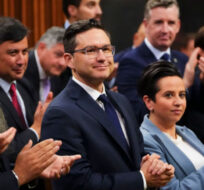 Conservative MP’s applaud Leader Pierre Poilievre as he stands during question period in the House of Commons on Parliament Hill in Ottawa, on Monday, Oct. 17, 2022. Sean Kilpatrick/The Canadian Press.