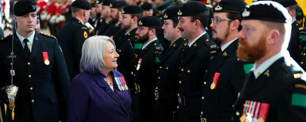 Governor General Mary Simon inspects the regiment at the Royal Canadian Dragoons present the 5th regimental guidon during a ceremony at the Worthington Barracks at Garrison Petawawa, Ont., on Friday, Dec. 9, 2022. Sean Kilpatrick/The Canadian Press.