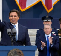 Florida Gov. Ron DeSantis waves to the crowd after being sworn in to begin his second term during an inauguration ceremony outside the Old Capitol Tuesday, Jan. 3, 2023, in Tallahassee, Fla. Lynne Sladky/AP Photo.