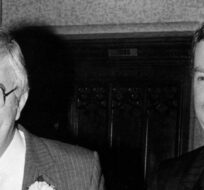 Finance Minister John Crosbie and Prime Minister Joe Clark laugh together as they walk to the House to present their first budget, in Ottawa, Dec. 11, 1979. Red MacIver/CP Photo.