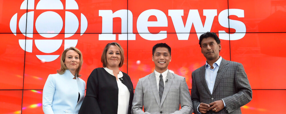 Adrienne Arsenault, Rosemary Barton, Andrew Chang and Ian Hanomansing (left to right) are named the new hosts of "The National," at a news conference in Toronto, Tuesday, Aug.1, 2017. Nathan Denette/The Canadian Press. 