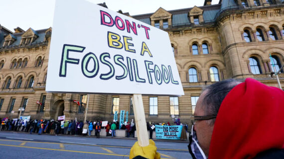 Climate action protestors gather in front of the PMO office to call on Justin Trudeau to prioritize the passage of the Just Transition Act in Parliament as the 44th session of Parliament start in Ottawa on Monday, Nov. 22, 2021. Sean Kilpatrick/The Canadian Press. 