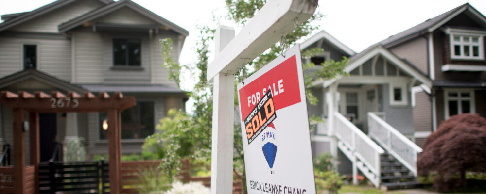 A real estate sign is pictured in Vancouver, B.C., Tuesday, June, 12, 2018. Jonathan Hayward/The Canadian Press. 