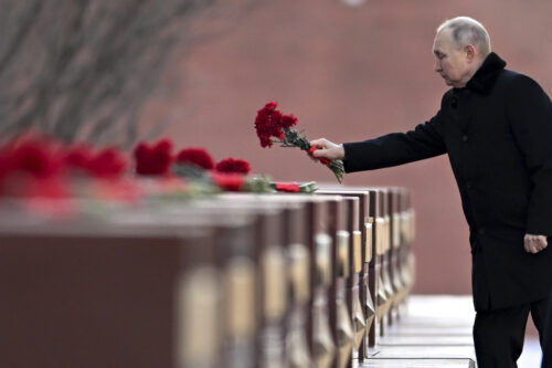 Russian President Vladimir Putin attends a wreath-laying ceremony at the Tomb of the Unknown Soldier, near the Kremlin Wall in Moscow, Russia on Feb. 23, 2023. Pavel Bednyakov via AP Photo.