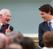 Governor General David Johnston shares a laugh with Prime Minister Justin Trudeau after he was sworn in as prime minister at Rideau Hall in Ottawa on Wednesday, Nov. 4, 2015. Justin Tang/The Canadian Press. 