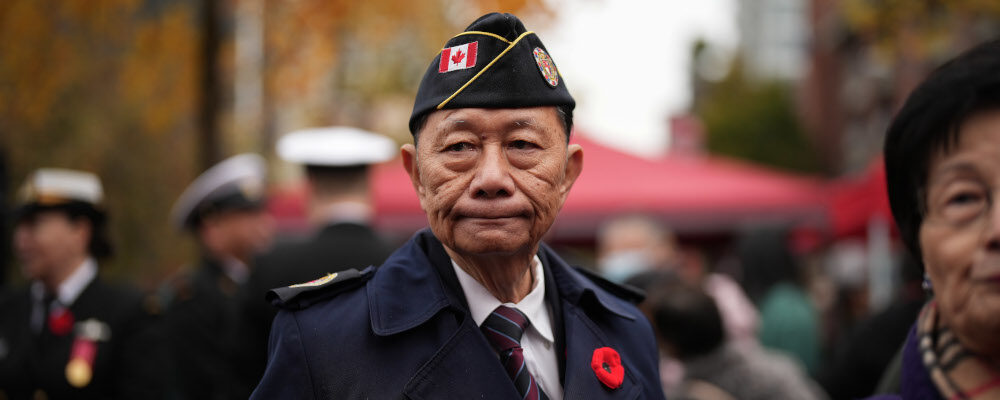 Samuel Chan, an honorary member of the Army, Navy & Air Force Veterans in Canada, attends a Remembrance Day ceremony marking the sacrifices of the early Chinese pioneers and Chinese-Canadian military veterans, at the Chinatown Memorial Monument in Vancouver, Friday, Nov. 11, 2022. Darryl Dyck/The Canadian Press. 