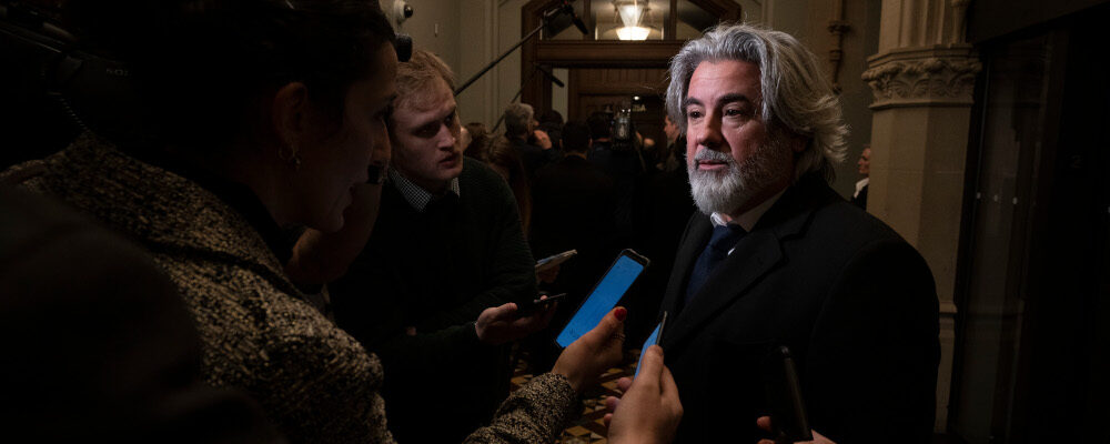 Heritage Minister Pablo Rodriguez speaks with reporters as he arrives for caucus, Wednesday, February 8, 2023 in Ottawa. Adrian Wyld/The Canadian Press. 