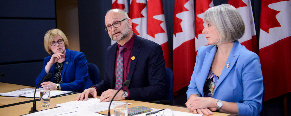 Carla Qualtrough, Minister of Employment, Workforce Development and Disability Inclusion, left to right, David Lametti, Minister of Justice and Attorney General of Canada, and Patty Hajdu, Minister of Health, make an announcement regarding a Bill entitled "An Act to amend the Criminal Code (medical assistance in dying)" during a press conference at the National Press Theatre in Ottawa on Monday Feb. 24, 2020. Sean Kilpatrick/The Canadian Press. 