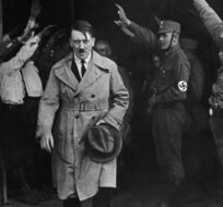  In this Dec. 5, 1931 file photo Adolf Hitler, leader of the National Socialists, emerges from the party's Munich headquarters. AP Photo/file.