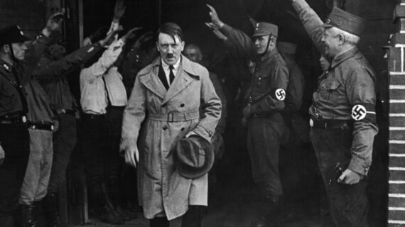  In this Dec. 5, 1931 file photo Adolf Hitler, leader of the National Socialists, emerges from the party's Munich headquarters. AP Photo/file.