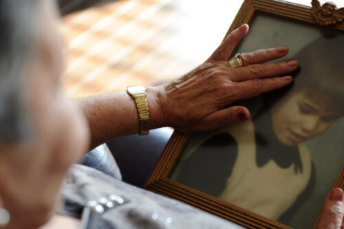 Sharon Rosenfeldt holds a photo of her late son Daryn Johnsrude at her home in Carleton Place, Ont., on Wednesday, September 21, 2011. Daryn was killed at the age of 16 by serial killer Clifford Olson. Sean Kilpatrick/The Canadian Press. 