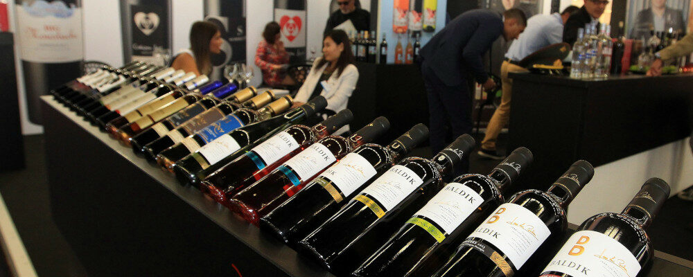 Bottles of wine are displayed at the international wine fair "Vinexpo" in Bordeaux, southwestern France, Sunday, June 14, 2015. Bob Edme/AP Photo.