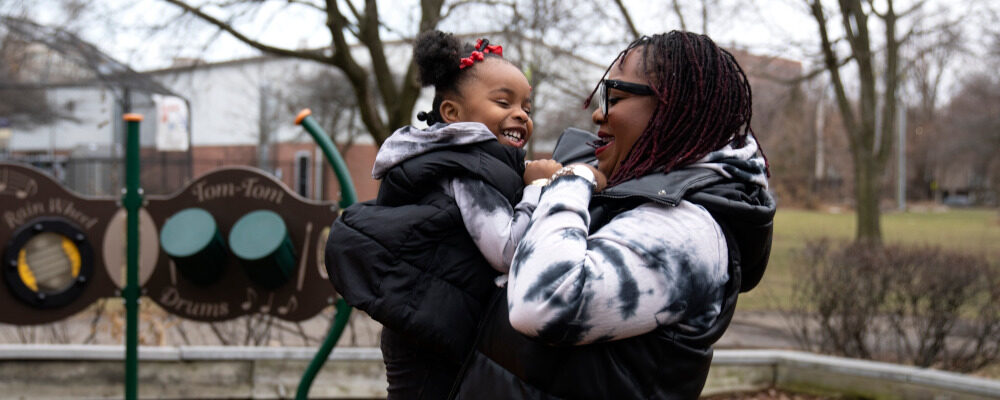 Chicago educator Tamisha Holifield spends time with her 2-year-old daughter Rian Holifield at Nichols Park, Thursday, Dec. 29, 2022. Erin Hooley/AP Photo. 