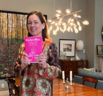 Laura Calder with her book, Kitchen Bliss: Musings on Food and Happiness (With Recipes). Credit: Malcolm Jolley. 
