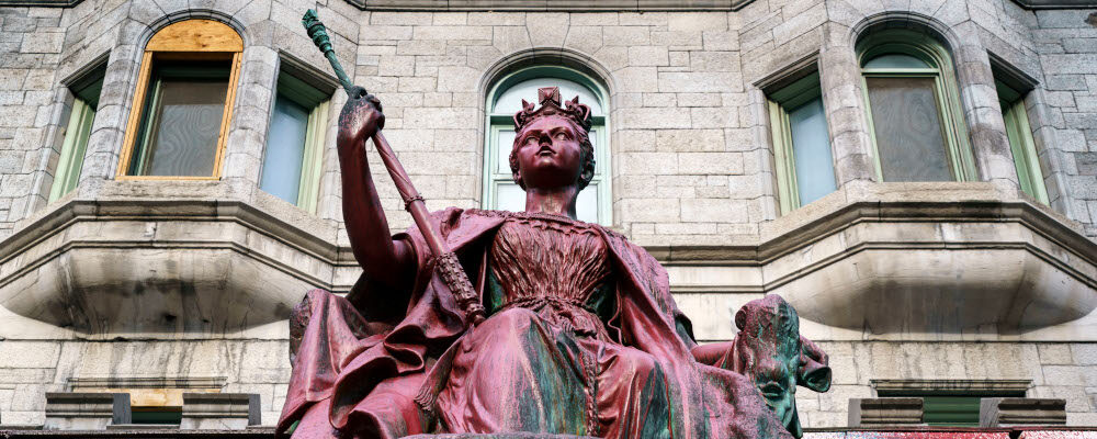 A vandalized statue of Queen Victoria is seen on the McGill University campus in Montreal on Thursday, March 18, 2021. Paul Chiasson/The Canadian Press. 
