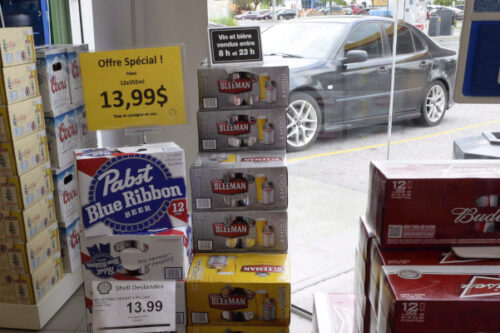 Beer is on display inside a store in Drummondville, Que., on July 23, 2015, the day of a Supreme Court of Canada decision about a New Brunswick man's cross-border booze run. Ryan Remiorz/The Canadian Press.