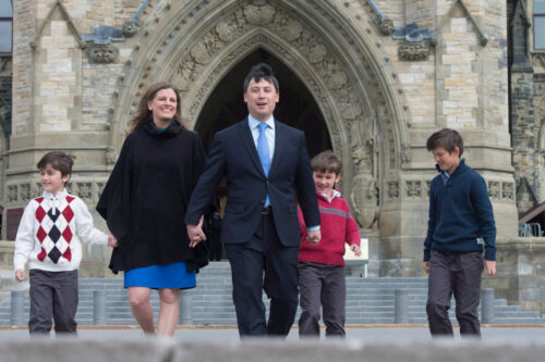 Conservative MP Michael Chong walks with his wife Carrie and sons Cameron (left), Alistair and William (right) to a news conference in Ottawa, Monday May 16, 2016. Adrian Wyld/The Canadian Press. 