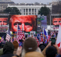 Supporters of President Donald Trump supporters attend a rally near the White House in Washington, on Jan. 6, 2021. John Minchillo/AP Photo.