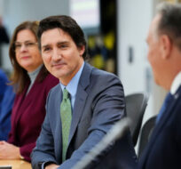 Prime Minister Justin Trudeau sits beside Manitoba Premier Heather Stefanson, left, and Quebec Premier Francois Legault, right as he meets with Canada's premiers in Ottawa on Tuesday, Feb. 7, 2023 in Ottawa. Sean Kilpatrick/The Canadian Press. 
