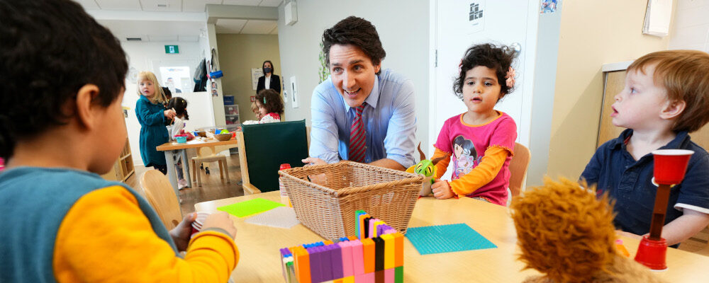 Prime Minister Justin Trudeau sits with children at a local child care centre in Ottawa, Wednesday, March 29, 2023. Sean Kilpatrick/The Canadian Press. 