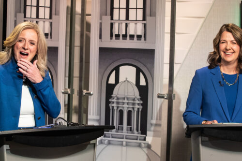 Leader of the NDP Rachel Notley, left, and leader of the United Conservative Party Danielle Smith prepare for a debate in Edmonton on May 18, 2023. Jason Franson/The Canadian Press.
