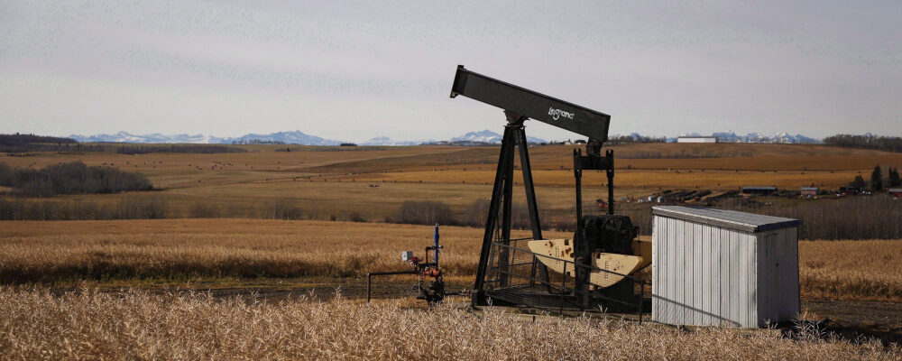 A de-commissioned pumpjack is shown at a well head on an oil and gas installation near Cremona, Alta., Saturday, Oct. 29, 2016. Jeff McIntosh/The Canadian Press. 