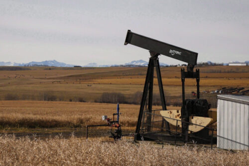 A de-commissioned pumpjack is shown at a well head on an oil and gas installation near Cremona, Alta., Saturday, Oct. 29, 2016. Jeff McIntosh/The Canadian Press. 