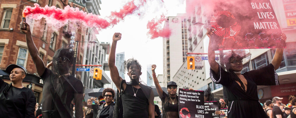 People from the Blacks Lives Matter movement march during the Pride parade in Toronto, Sunday, June 25, 2017. Mark Blinch/The Canadian Press. 